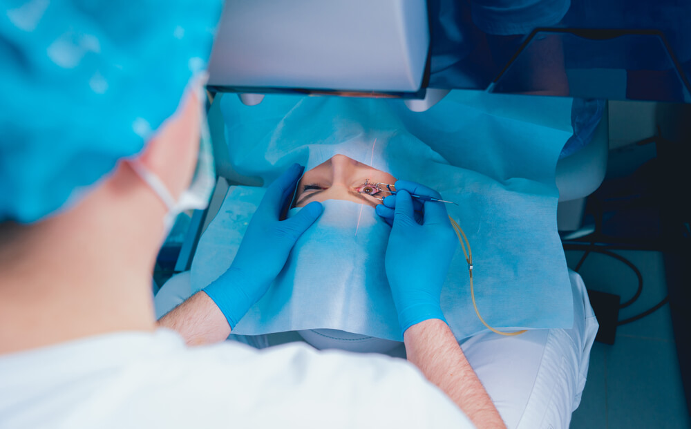 A Patient and Team of Surgeons in the Operating Room During Ophthalmic Surgery